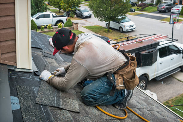 Professional Roofing technician working in Longmire, WA